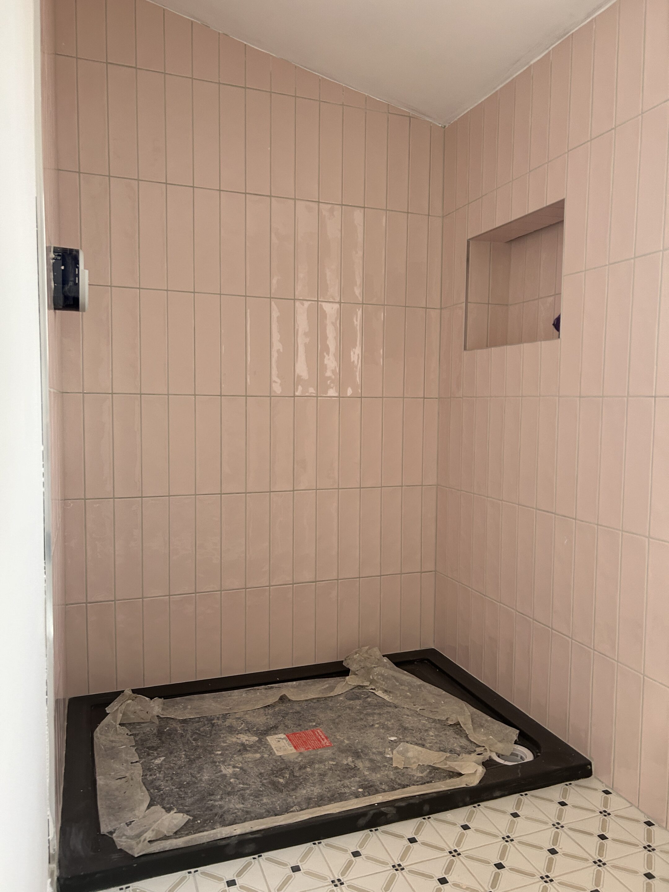 Shower room tiled walls and floor